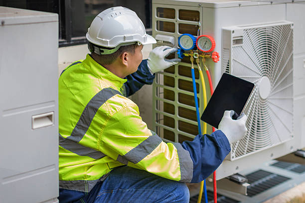 Professional Hvac technician working in Springville, AL